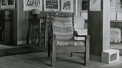 Scene from the video showing a chair in the living room.