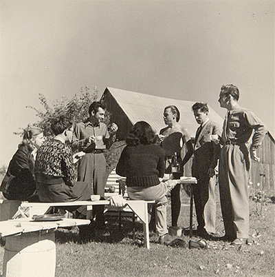 Picnic in Saint-Hilaire. Photo showing members of the Automatistes having a meal in a rural setting in the summertime.