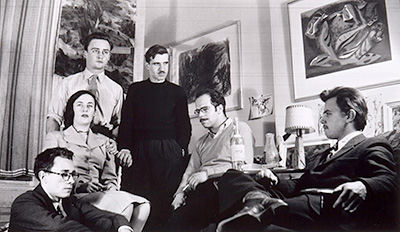 Group portrait in Fernand Leduc's studio in which we can see several of the Automatists.